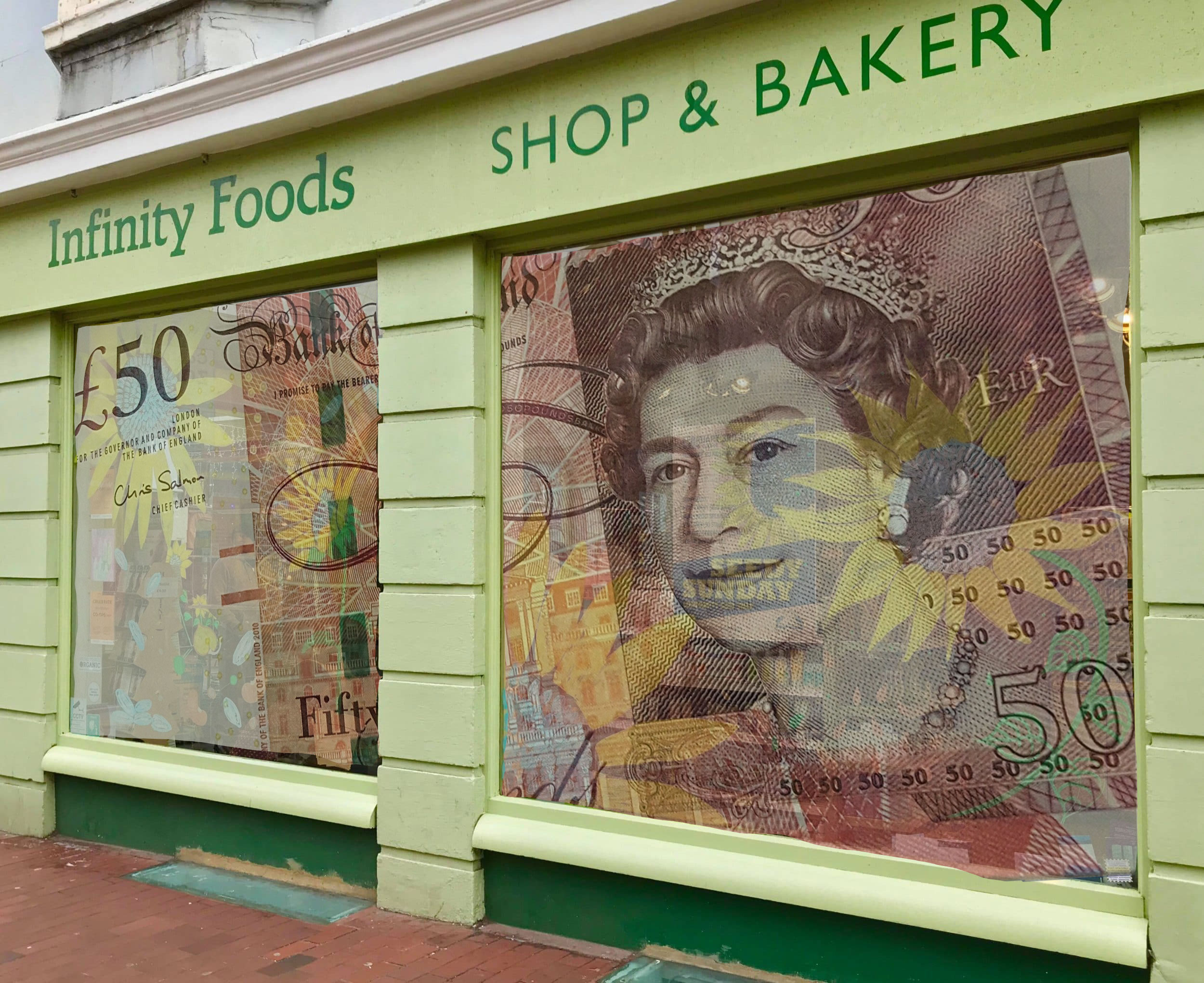 image of shop with £50 note super imposed in window